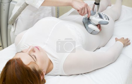 Photo for Woman is in the process at the clinic lipomassage - Royalty Free Image