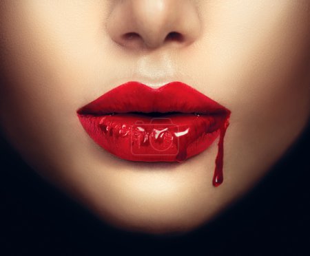 Photo for Sexy vampire woman lips with dripping blood - Royalty Free Image