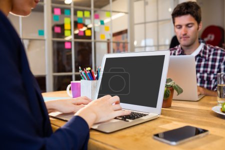 business people working at computer desk