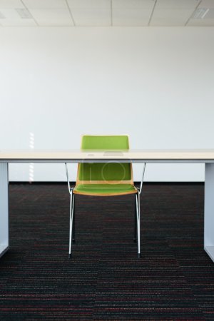 Photo for Photo of an empty office room with a desk and chair - Royalty Free Image