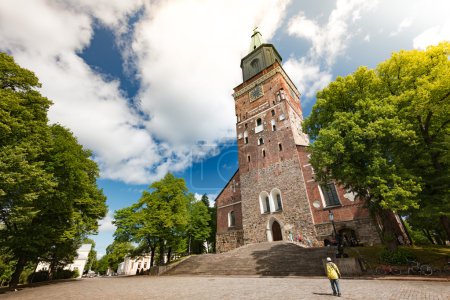 Photo for Turku Cathedral on sunny day with blue cloudy sky in background and square in foreground - Royalty Free Image