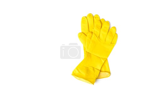 Yellow rubber gloves isolated on white background.