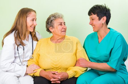 Photo for Photo of happy elderly woman with her daughters - Royalty Free Image