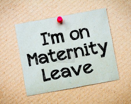 Photo for Recycled paper note pinned on cork board.I'm on Maternity Leave Message. Concept Image - Royalty Free Image