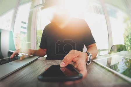 Photo for Website designer working blank screen digital tablet and computer laptop with smart phone on wooden desk as concept - Royalty Free Image