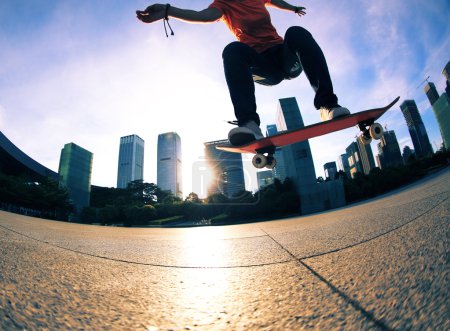 female skateboarder skateboarding