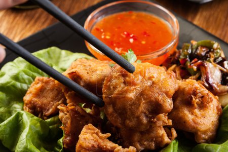 Fried chicken pieces in batter