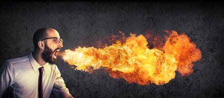 Photo for Angry and furious announcement - businessman spitting fire - Royalty Free Image