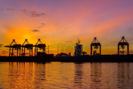 Photo for Shipping port with the sunrise in the morning. - Royalty Free Image