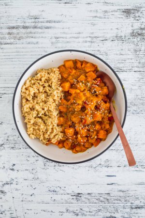 vegan pumpkin and bel pepper curry with brown rice, healthy plant-based food recipes