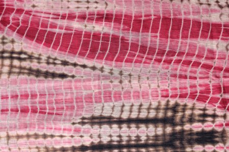 Photo for High resolution image of tie and dye textile in red ,black, pink colors - Royalty Free Image