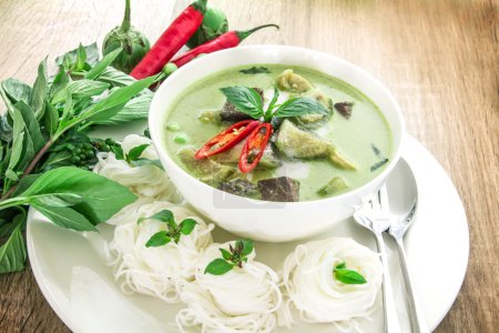 Green curry creamy coconut milk with chicken , Popular Thai food