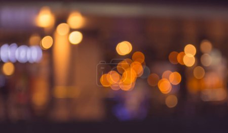 imagen de fondo borroso bokeh con cálidas luces de colores. (tono vintage)
