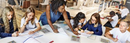 Photo for Group of children studying in library with teacher, knowledge Concept. Original photoset - Royalty Free Image