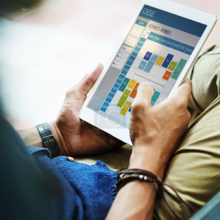 Man Working with digital tablet