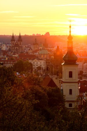 The Gothic church of Our Lady before Tyn during amazing sunrise. City of hundred spires. Beautiful summer morning. Prague, Czech republic