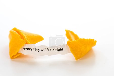 Photo for Open fortune cookie with strip of white paper - EVERYTHING WILL BE ALRIGHT - Royalty Free Image