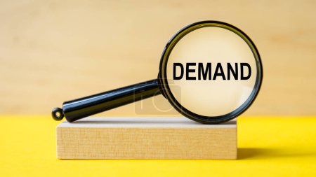 Photo for Admission word demand magnifying glass on wooden background. the magnifying glass is mounted on a wooden stand on a yellow table - Royalty Free Image