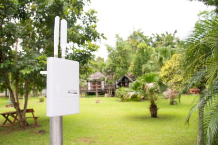 Photo for Install outdoor wireless internet access equipment. - Royalty Free Image