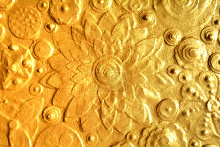 Gold textured floral background surface