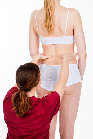 Photo for Physiotherapist doing back evaluation - Royalty Free Image