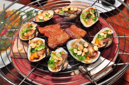 Filetes de concha en la parrilla
