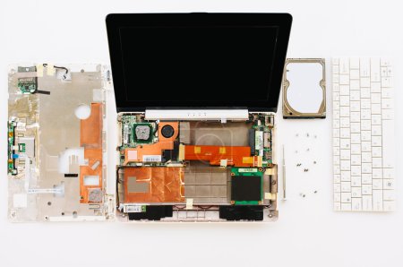 Photo for Details of the disassembled broken laptop. Hdd, keyboard, monitor - Royalty Free Image