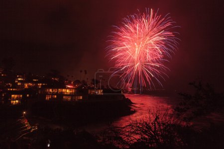 Photo for Laguna Beach, California, July 4, 2016: Laguna Beach fireworks / city lights on the forth of July celebration - Royalty Free Image