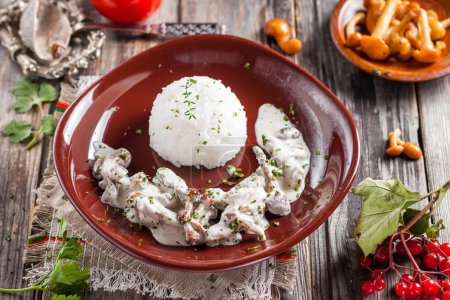 Photo for Beef Stroganoff with mushrooms and rice. Russian kitchen - Royalty Free Image