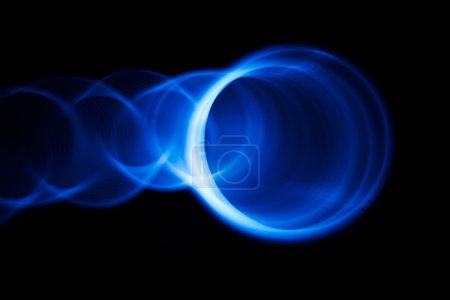 Photo for Sound waves in the visible blue color in the dark - Royalty Free Image