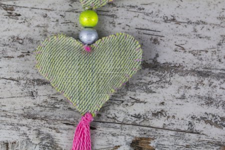 Photo for Handmade heart for valentines, in a wood background - Royalty Free Image