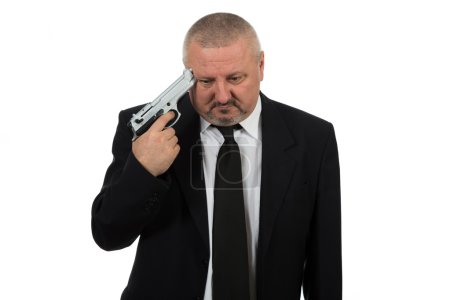 Photo for Businessman with gun wants to commit suicide isolated on white background - Royalty Free Image