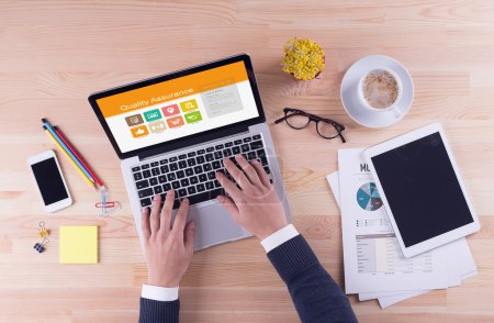 Photo for Business desk concept - Quality Assurance - Royalty Free Image