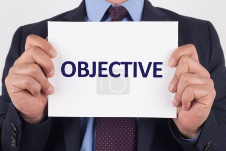 Photo for Businessman showing white paper with text objective - Royalty Free Image